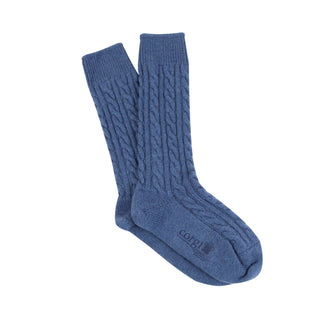 A pair of blue cashmere socks with a cable knit pattern, displayed against a white background.