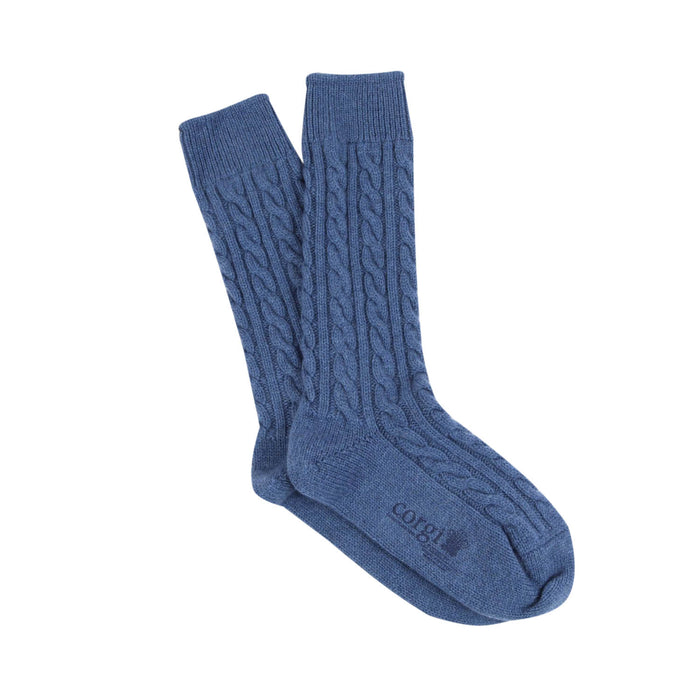 A pair of blue cashmere socks with a cable knit pattern, displayed against a white background.