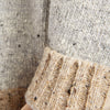 Close-up of textured fabric with a focus on pattern and color.