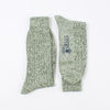 green marl socks laid flat side by side.