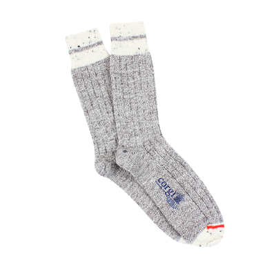 A pair of men's striped cuff British wool socks in gray with a neon flash on the toe area, designed for comfort and sustainability.
