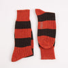 orange and brown striped socks on a white background