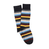 Pair of striped socks with black, blue, yellow, and gray colors on a white background