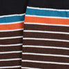 Close-up of striped fabric with blue, orange, and brown colors.