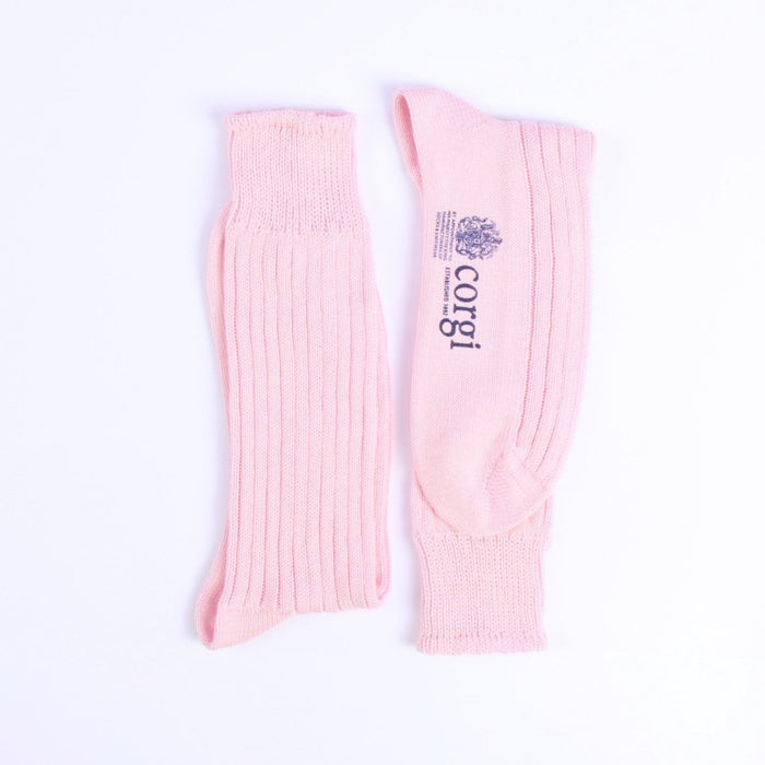 Pair of pink crew length socks with 'Corgi' branding on a white background