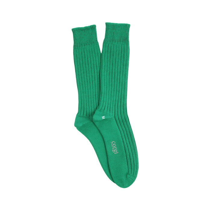 green pure cotton boots socks laid flat on a white background