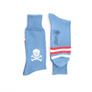 Two blue socks with skull and crossbones design and red and white stripes on a white background