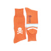 Orange socks with skull and crossbones design and 'corgi' branding on a white background