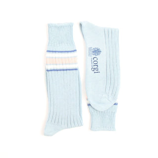 Light blue socks with striped pattern just below the cuff and 'corgi' branding on a white background