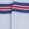 Close-up of a sock with blue, red, and white stripes 