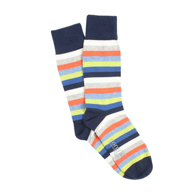 Colorful striped socks with navy cuff, heel and toe on a white background