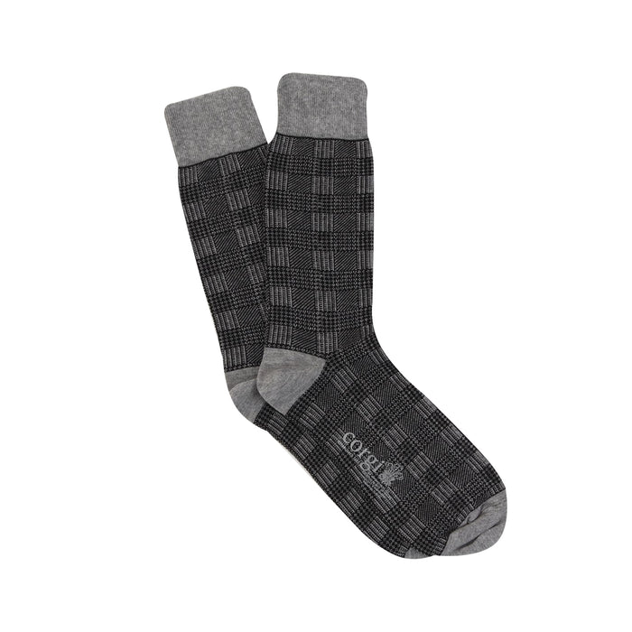 A pair of men's formal woven check cotton socks in black and white, 