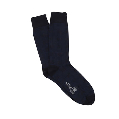 A pair of men's formal woven check cotton socks in navy and blue on a white background, 