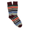 Colourful striped socks with a fine white stripe separating each colour on a white background
