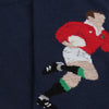 Socks with a rugby player design on a navy background