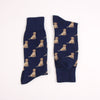 Navy blue socks with Labrador dog pattern photographed on a white background
