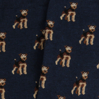 Pattern of dogs on a dark blue fabric background