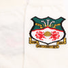 Embroidered crest on a white background