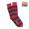 Red and navy striped socks with 'Combat Stress' text on a white background