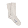 Pair of beige socks with a brand logo on a white background