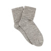 Pair of gray socks on a white background