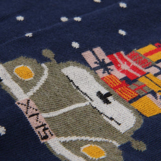 Sock with vintage car design featuring snow on a dark blue background