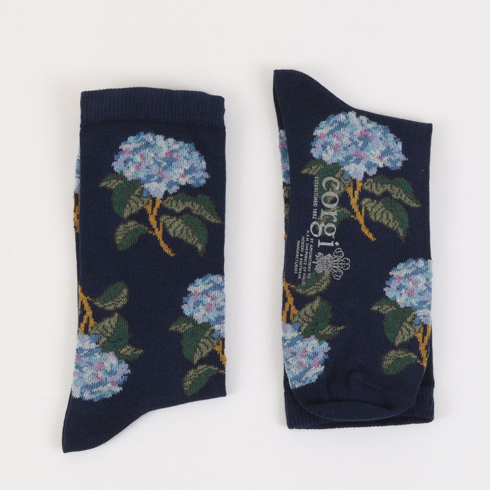 Navy socks with floral design on a white background