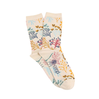 Pair of socks with coral reef design on a white background