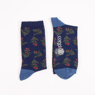 Navy socks with red berry pattern and blue toes and cuffs on a white background