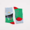 Two socks with football designs on a white background