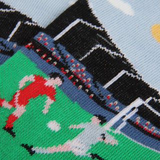 Close-up of a sock with a pattern of football players 