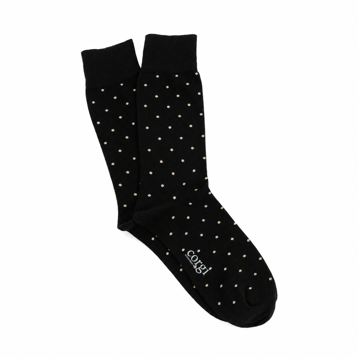 Black socks with white polka dots on a white background