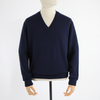 A navy men's classic V-neck sweater displayed on a mannequin.
