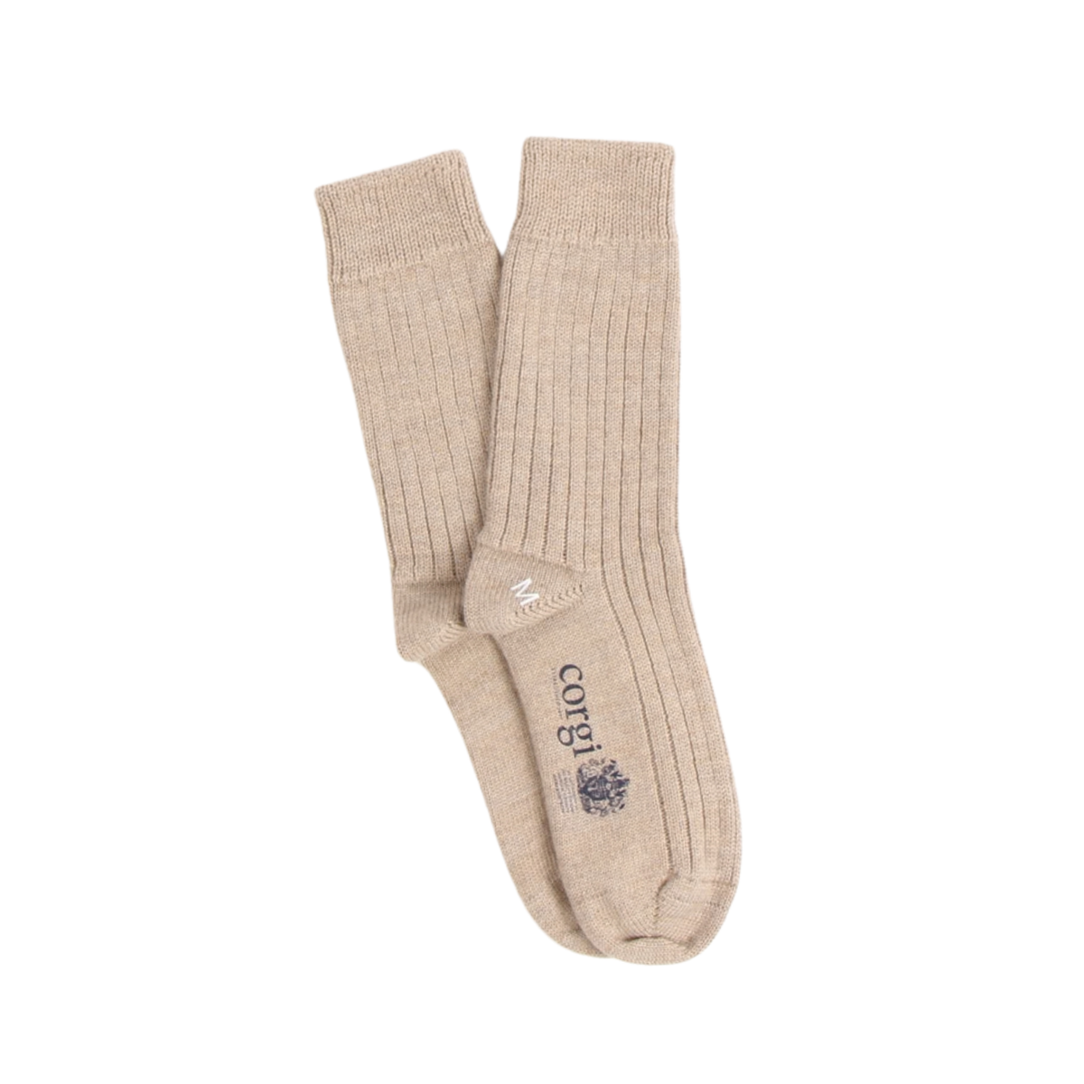 A pair of ribbed knit crew socks in a light beige/tan color, featuring a dark navy logo and text on the sole, displayed against a solid white background.