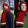 Red Wall scarves being worn by a man and woman.