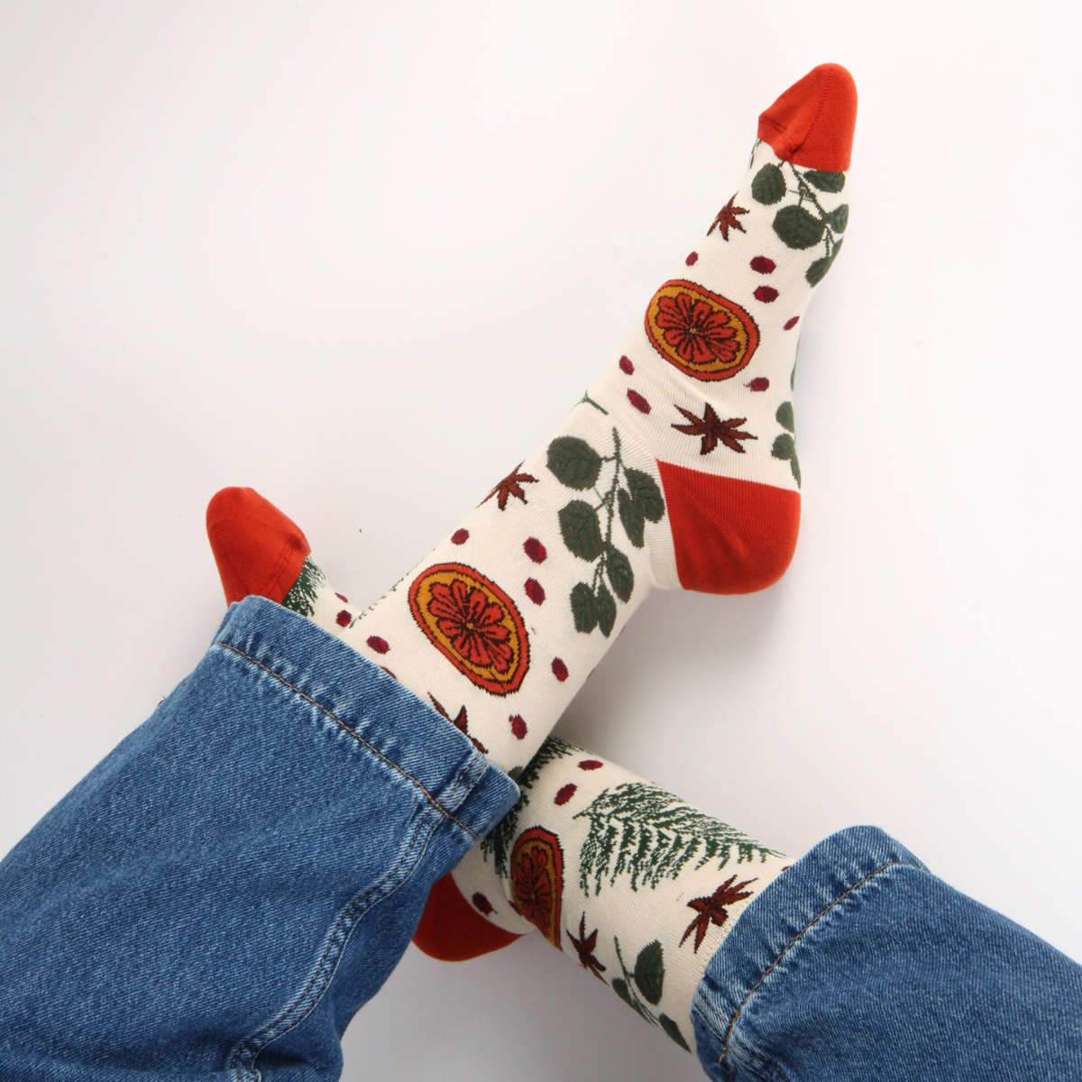 Decorative socks with floral pattern on a white background