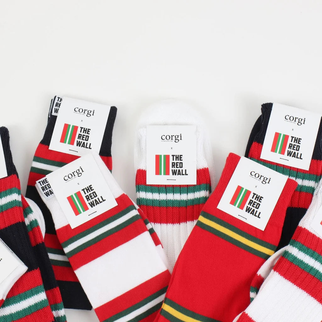 Collection of Red Wall socks on a white background.