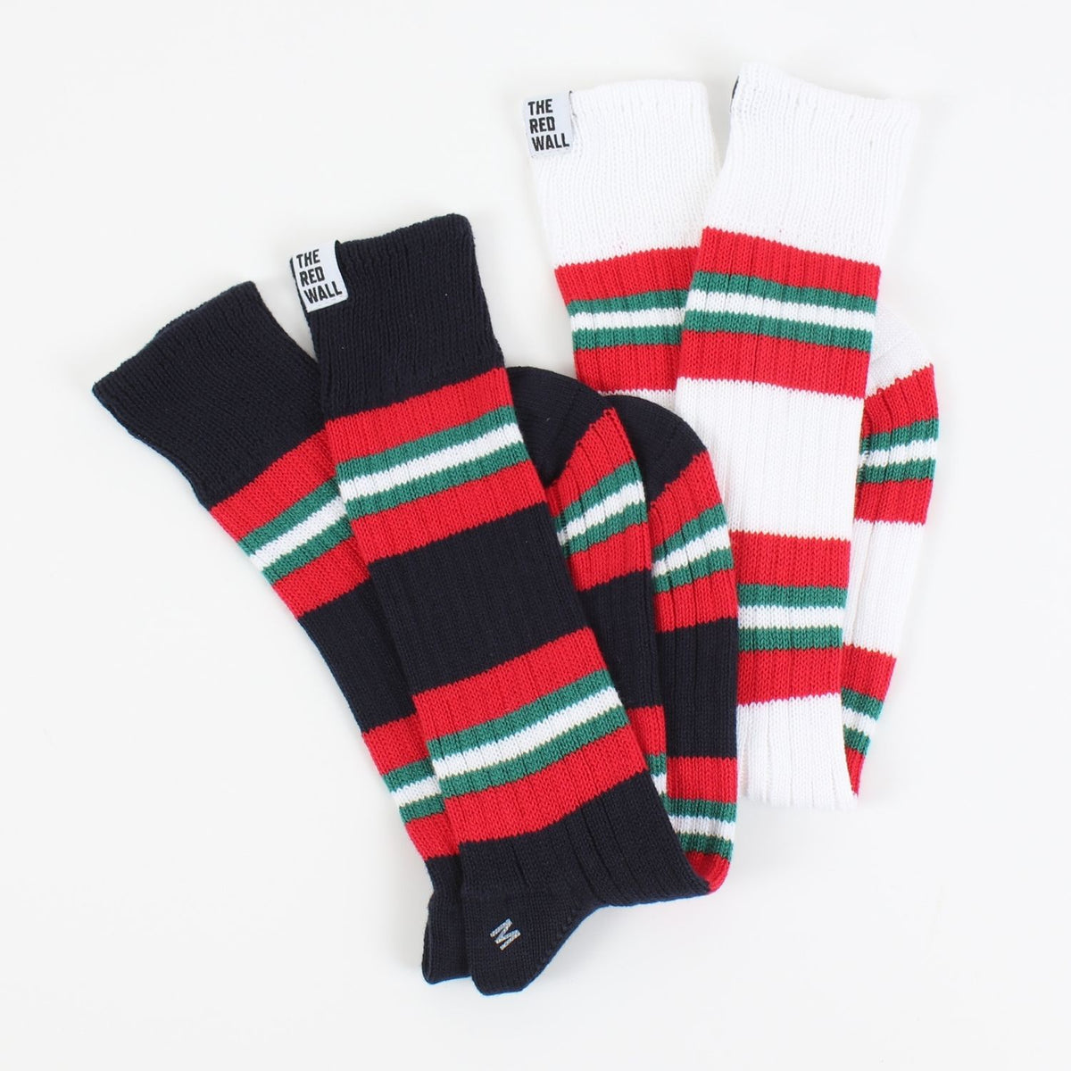 2 pairs of red wall socks laid flat on a white background.
