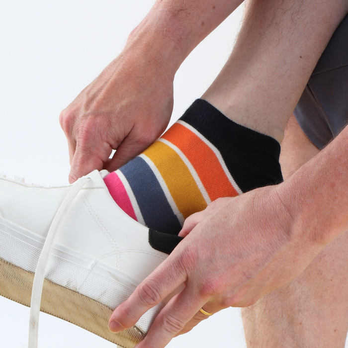 Man wearing Pantone Stripe Cotton Trainer Socks