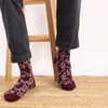 Maroon sock with pink leaf pattern