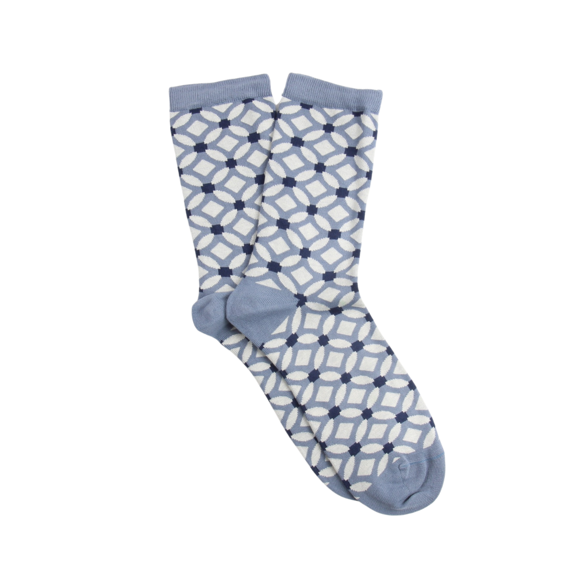 Pair of blue and white patterned socks on a white background