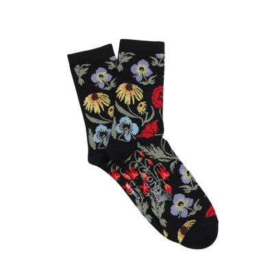 Black socks with colorful floral pattern on a white background