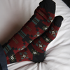 Pair of patterned socks on a white surface