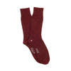 Maroon sock on a white background