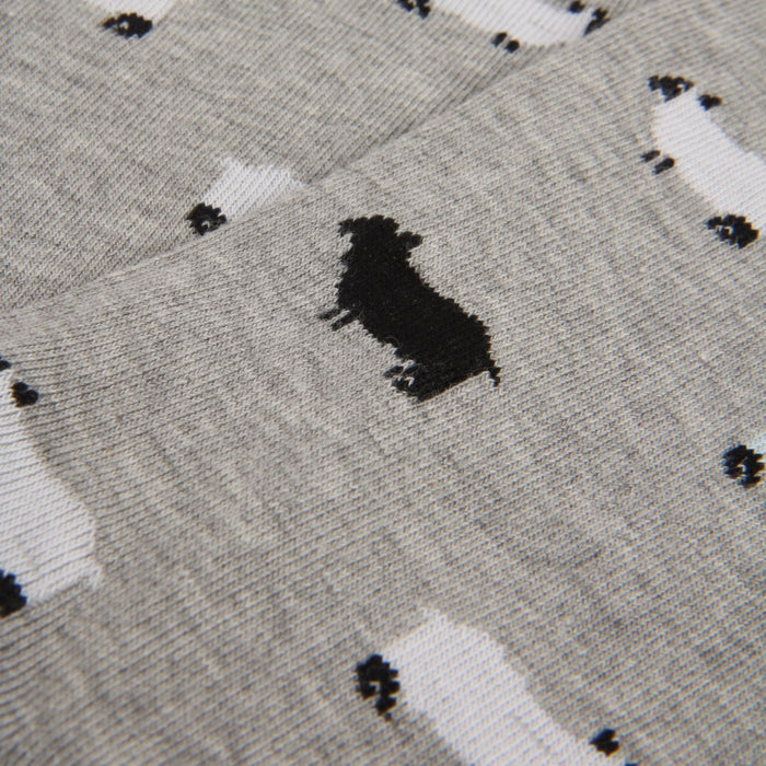 Close-up of a textured fabric with black and white pattern