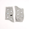 Gray socks with sheep pattern on a white background