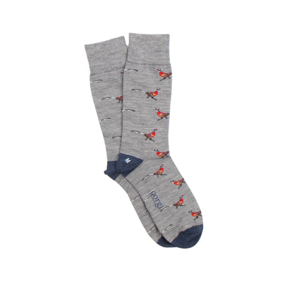 Grey socks with bird pattern on a white background