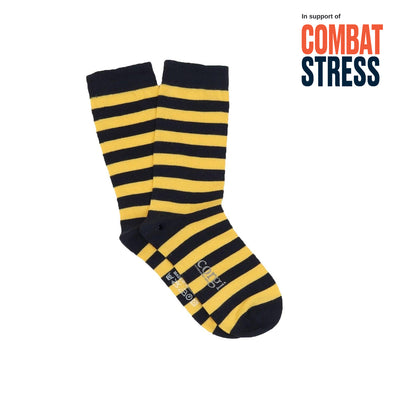 Navy and yellow striped socks with 'Combat Stress' text on a white background