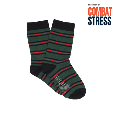 Green and black striped socks with red accents on a white background, featuring 'Combat Stress' text.